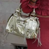 Bolso hebillas piel brillos dorado