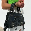 Bolso hebillas piel brillos negro