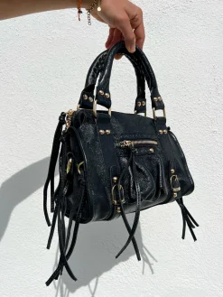 Bolso hebillas piel brillos negro