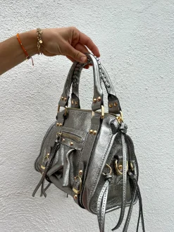 Bolso hebillas piel brillos plata