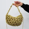 Bolso mano efecto nudo dorado
