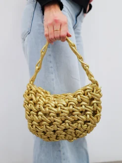Bolso mano efecto nudo dorado