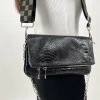 Bolso piel cadenas coco negro