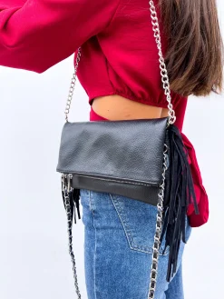 Bolso piel cadenas flecos negro