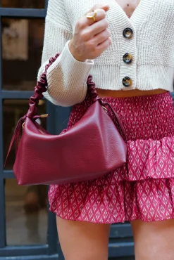 Bolso piel hombro rizo burdeos