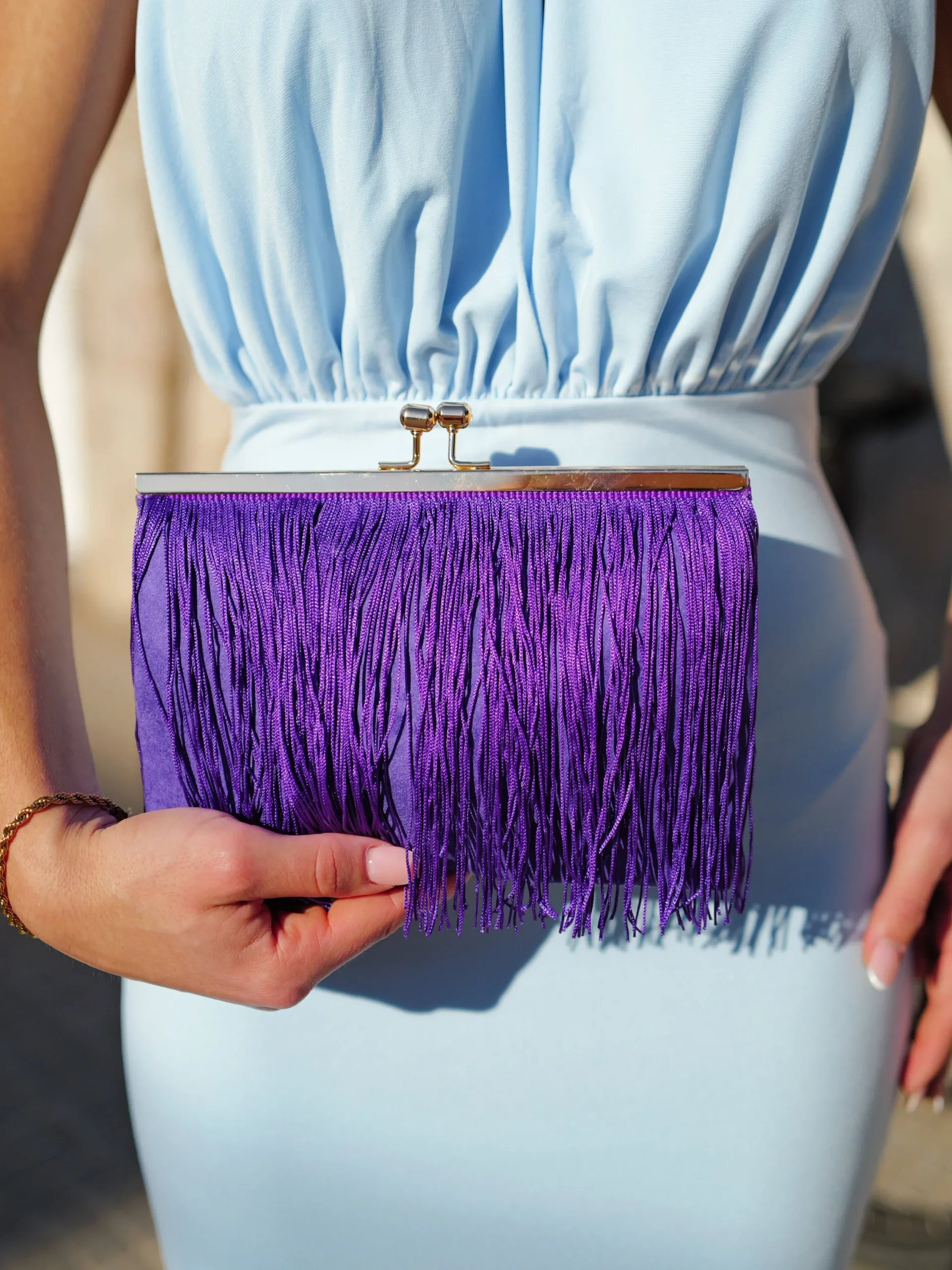 Clutch ante flecos morado