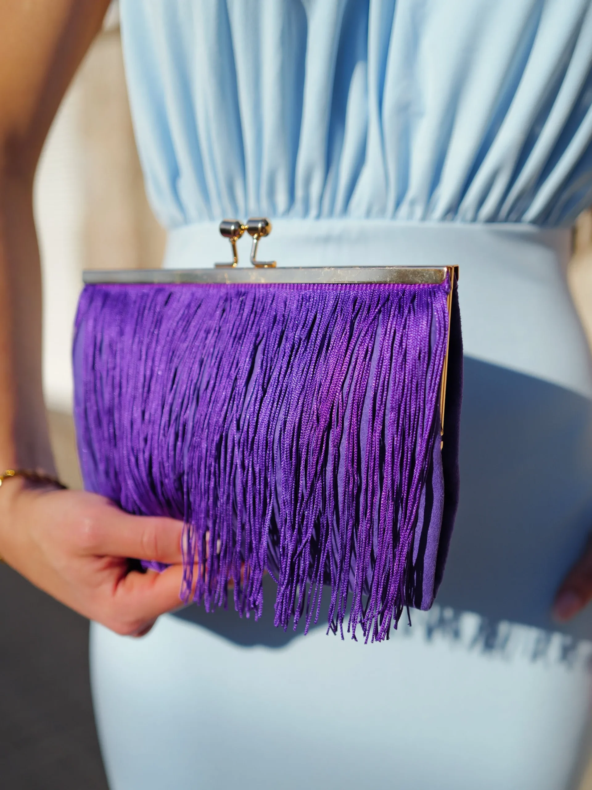 Clutch ante flecos morado