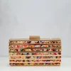 Clutch bandas colores dorado