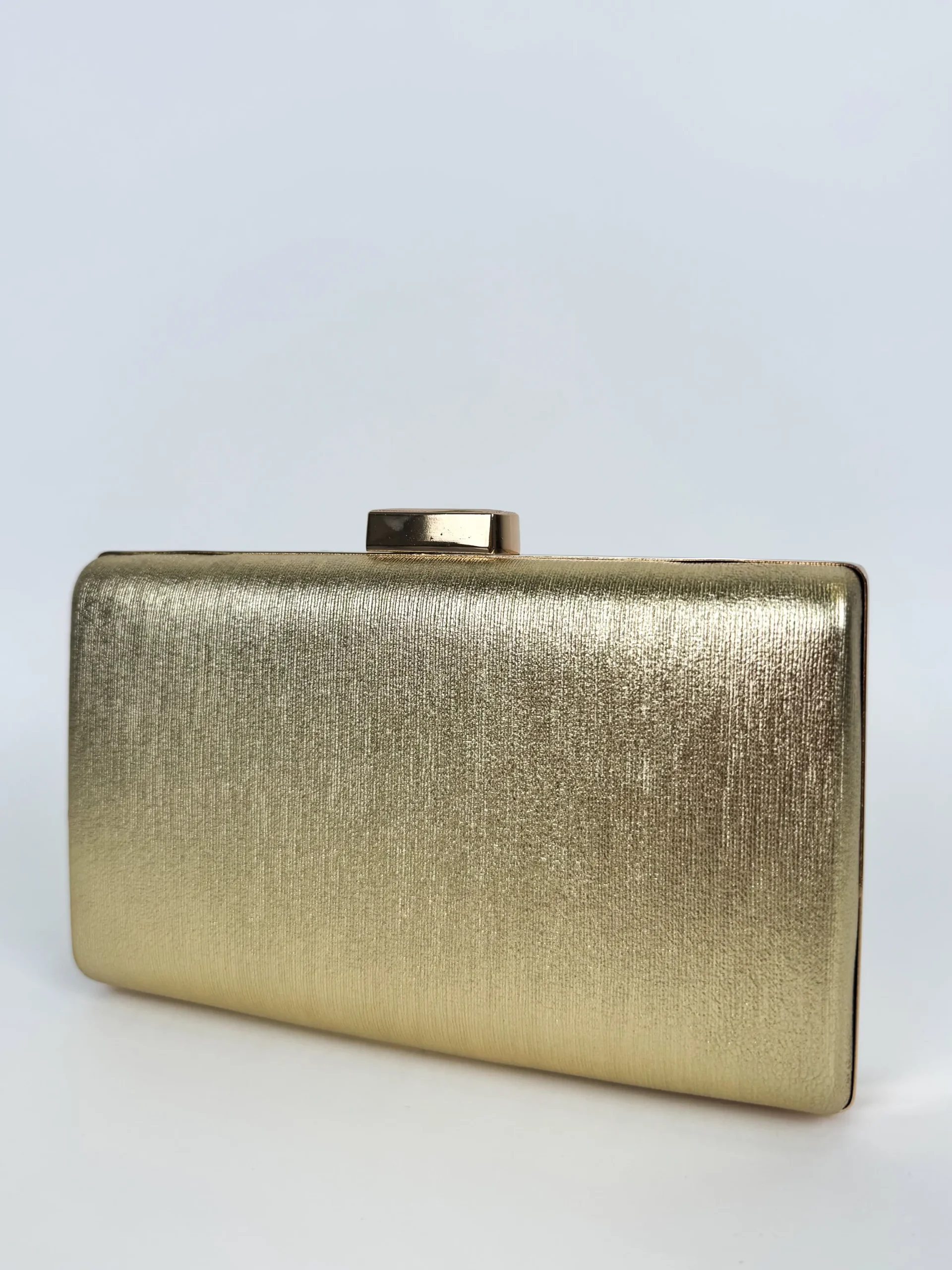 Clutch bandas dorado