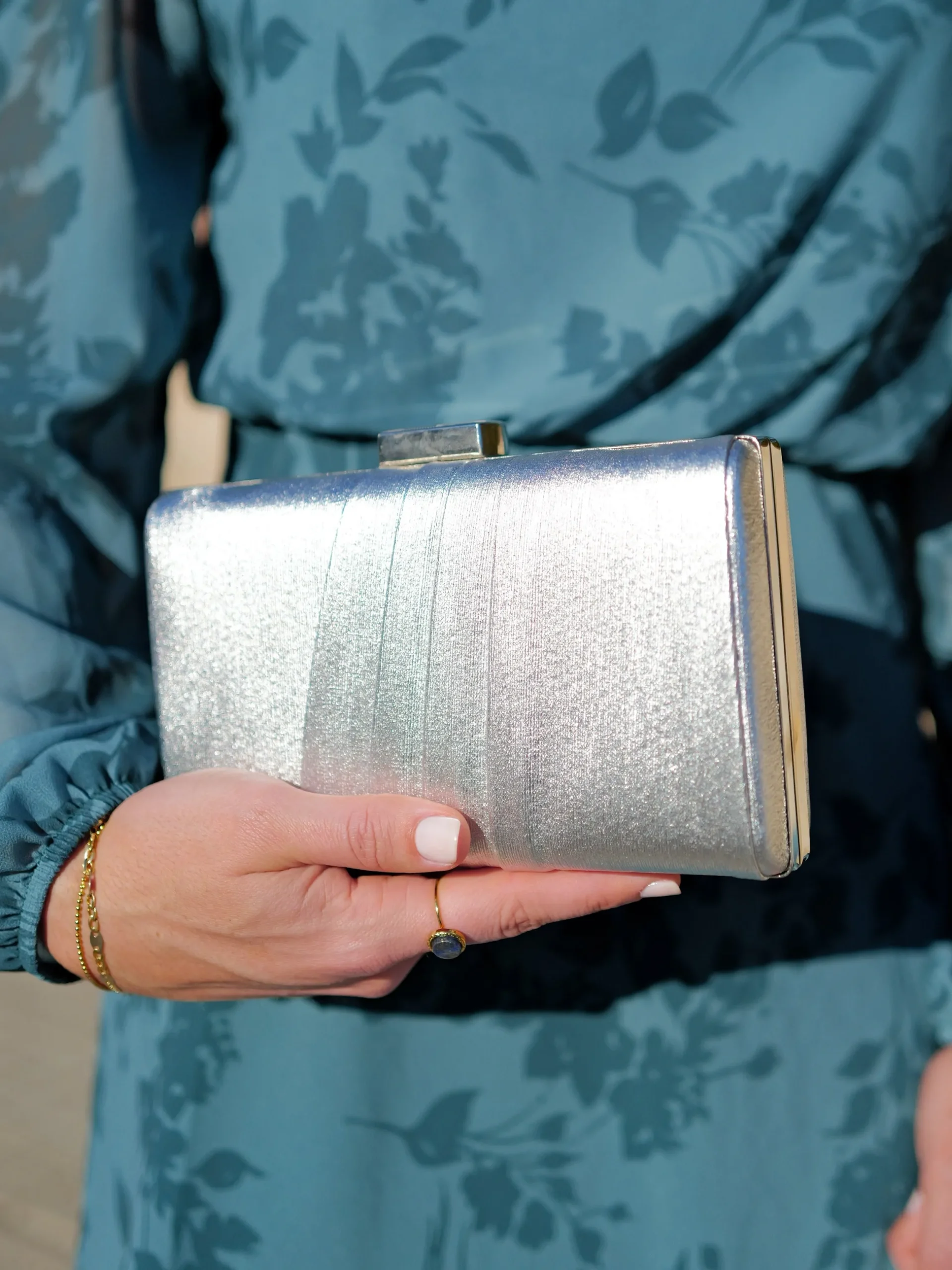 Clutch bandas plateado