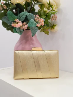 Clutch bandas textura dorado