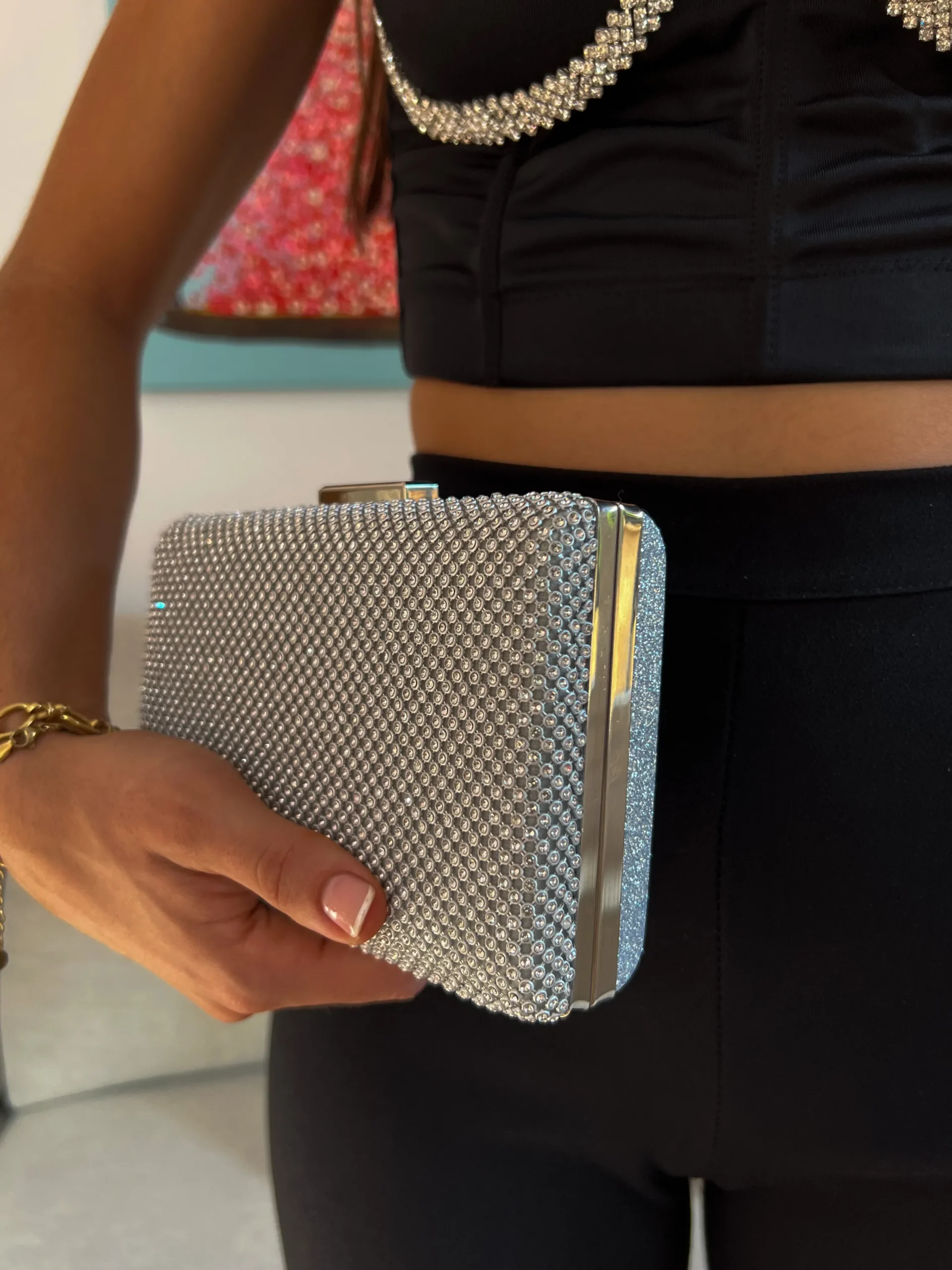 Clutch brillos plateado efecto