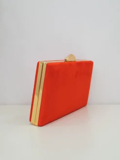 Clutch horizontal redondo naranja