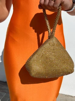 Clutch pocket brillos dorado
