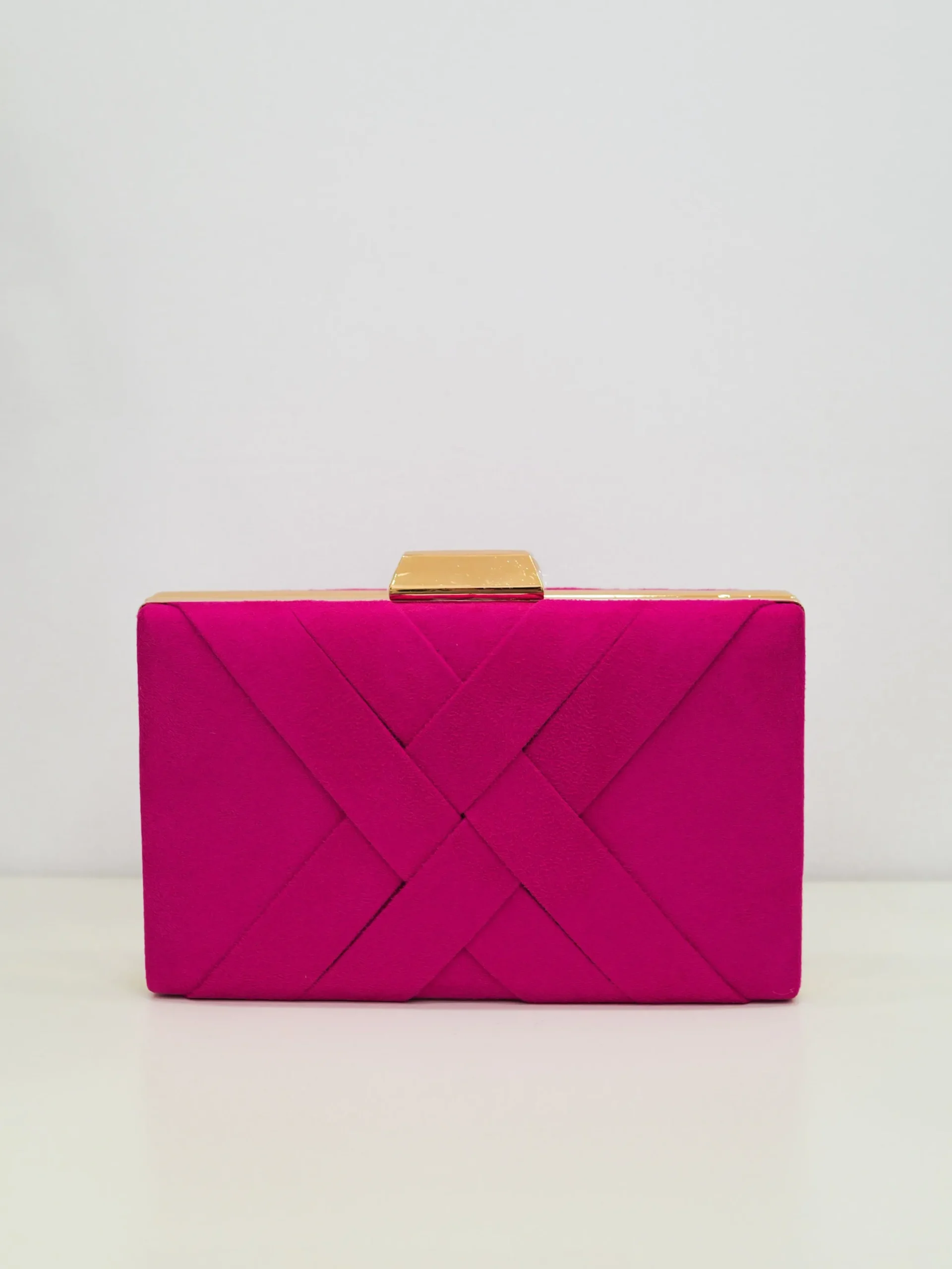 Clutch trenzado fucsia