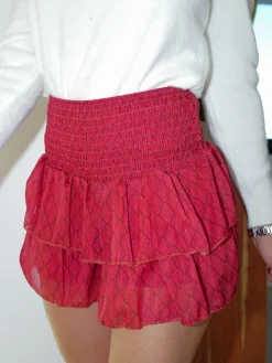 Falda mini nido estampada burdeos