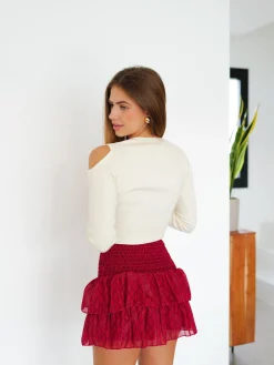 Falda mini nido estampada burdeos