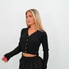 Falda mini nido volantes negro