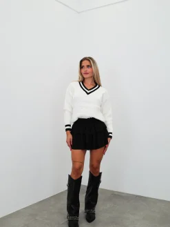 Falda mini nido volantes negro