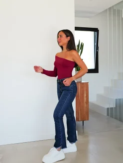 Jeans tiro bajo flecos