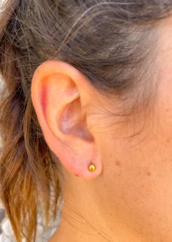 Pendientes bolita dorada