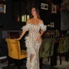 Vestido corse glitter plumas beige